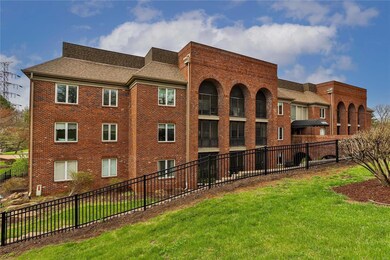Back of building, you can see the sunroom arches.