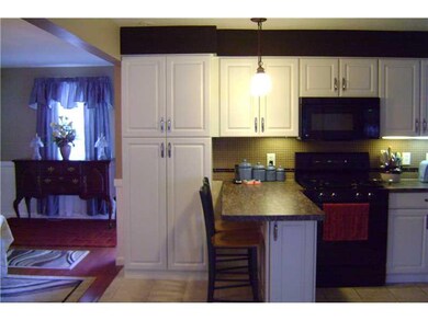 Kitchen. Updated white kitchen cabinets, newer cou