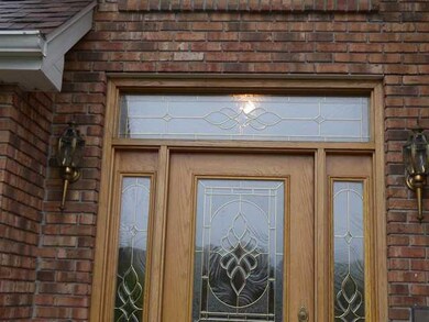 Exterior Front lead glass sidelights & transom win