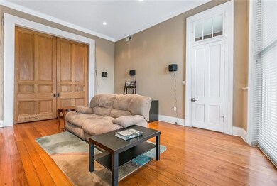 Kitchen on other side of pocket doors.  Entry door