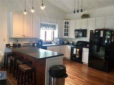 BEAUTIFUL KITCHEN WITH MODERN LIGHTING AND GRANITE