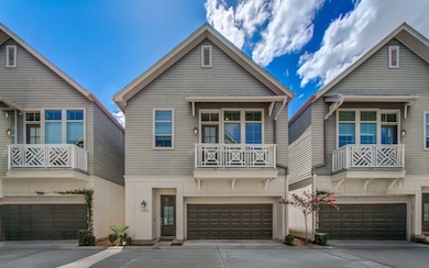 Modern home with 2-car garage and balcony