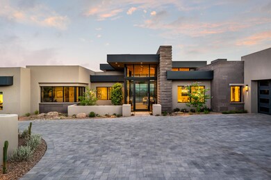 Dramatic Glass-Wrapped Entry