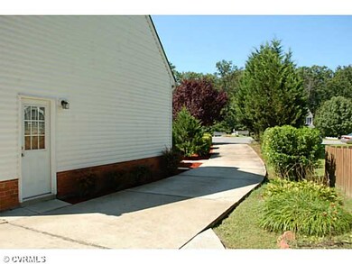 Exterior Back - Side of House & Driveway