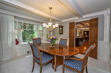 Formal Dining Room Overlooks back yard and patio -