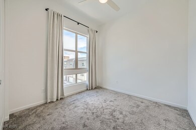 Carpeted empty room with plenty of natural light,