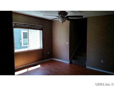 Dining Room. Dining and stairwell to upstairs