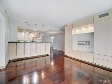 Livingroom with a view of the kitchen