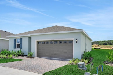 1018 Swamp Chestnut Loop, Lady Lake, FL 32159 - photo 2