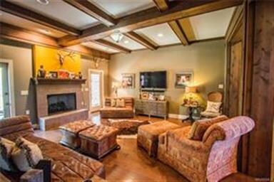 View of the family room with fireplace and exposed