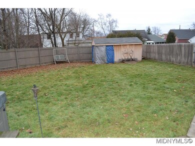 fenced yard and shed