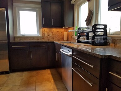 Granite and Quiet Close Cabinetry