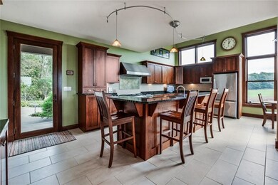 Large breakfast bar with Jenn Air range, cherry ca