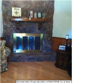 Living Room w/ Wood burning Fireplace ,