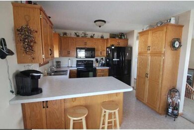 Nice kitchen with tons of cabinets.