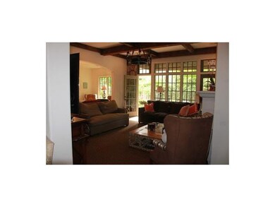 The great room features a wall of windows to take 
