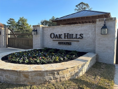 Beautiful gated entrance at Oak Hills Estates in H