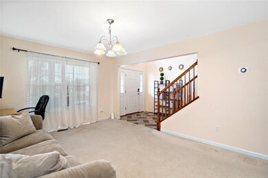 Living room with a view of the front yard.