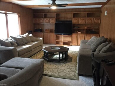 Large Family Room with built-ins. and bay window.