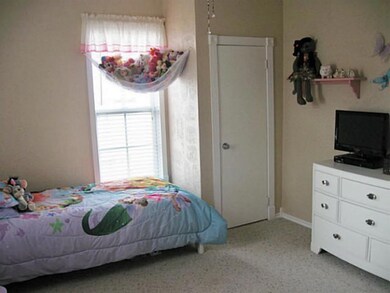 Bedroom. 2nd bedroom entry from foyer area.