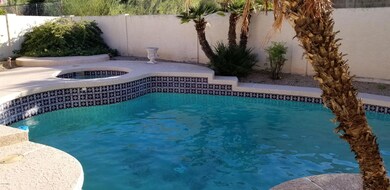 YARD BACKS TO AN ARROYO