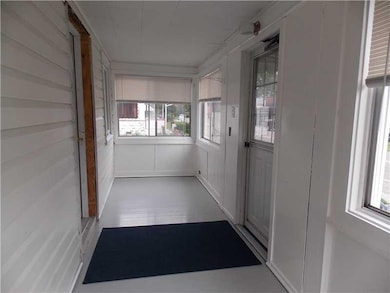 Exterior Front. Enclosed Front Porch