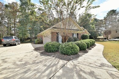 Side entry garage with extended parking