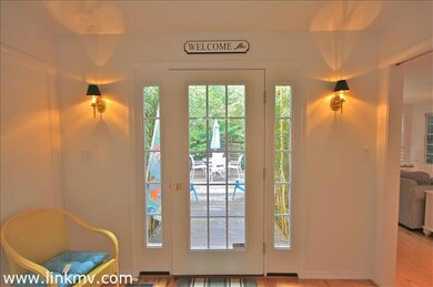 Front entry with deck access