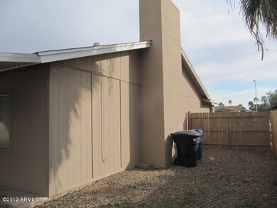 side of home (west)