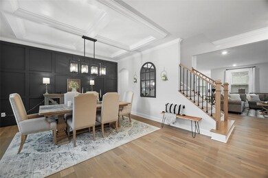 Formal Dining room w/coffered ceiling & accent wal