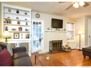 Another view of the living room showing the firepl