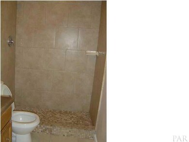 Beautiful tiled shower in master bathroom.