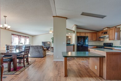 Open floor plan with new wood/laminate floors
