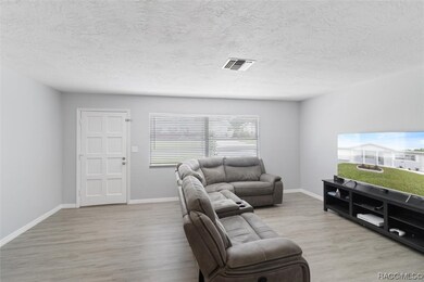 Living Room...Luxury Vinyl Planking Throughout ..F