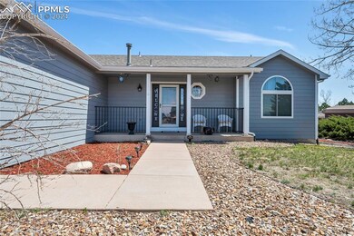 Property entrance with covered porch