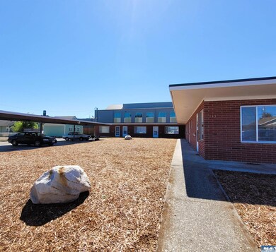 Units 2-6 each have an assigned carport parking sp