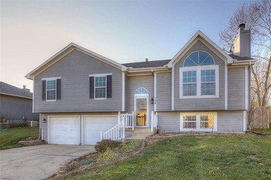 128 S Darrowby Dr, Raymore, MO 64083 - photo 2