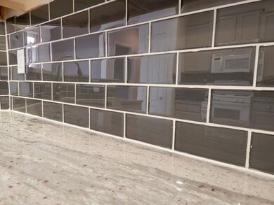 GLASS TILE AND GRANITE