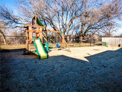 PRIVATE BACKYARD BACKING TO WOODED AREA WITH CREEK