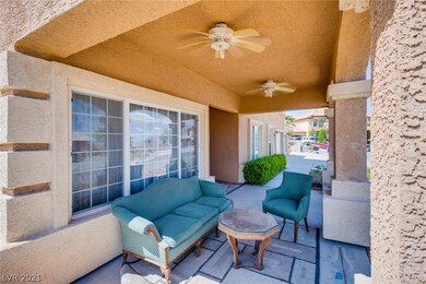 Front porch with 2 fans.