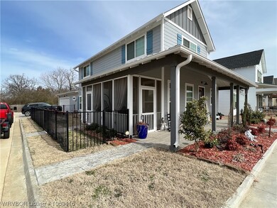 Side of home showing Screened in Porch fenced side