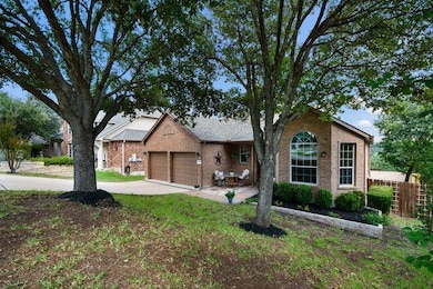 Single story home featuring concrete driveway, an