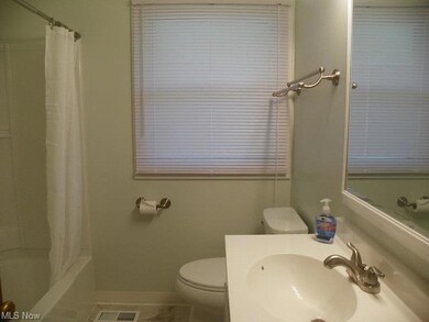 Main floor bath new tubwall and faucets as well as