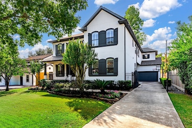 Arrive along the extended driveway to your gated entrance offering added privacy, leading to a spacious two-car garage. Mature trees and immaculate landscaping enhance the home’s curb appeal and create a picturesque setting.