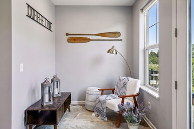 Located just off the kitchen, this little nook offers many flex options. Office space, sitting area, play space...you decide what works best for you!