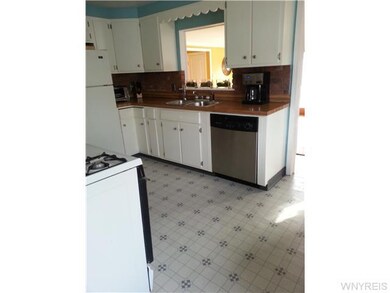 Kitchen. Moderately updated eat in kitchen with up