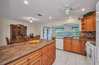 Updated kitchen with granite  counters and solid maple cabinetry