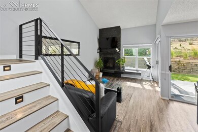 Main Living Area and lit staircase