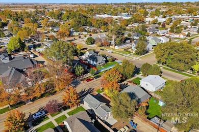 Aerial overview of property's location with nearby suburban area