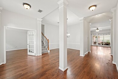 Beautiful floors draw the eye out to the backyard retreat.